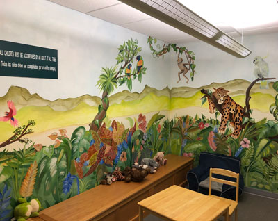 This is an image of a jumgle mural on the wall of the Children's Waiting Room in the Manatee County Judicial Center.