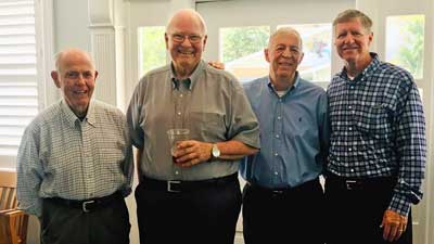 This is an image of four men.